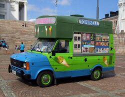 Mark one Ford Transit in Scooby Doo-inspired colours with rear windows that can be opened for operator to sell food out of, decorated with illustrations of the various types of frozen puddings it sells