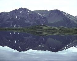 View of the Ahklun Mountains reflected in mirror-smooth Upper Togiak Lake.jpg