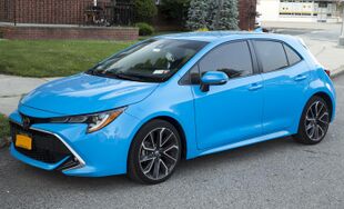 2019 Toyota Corolla XSE (MZEA12L) in Blue Flame, front left.jpg