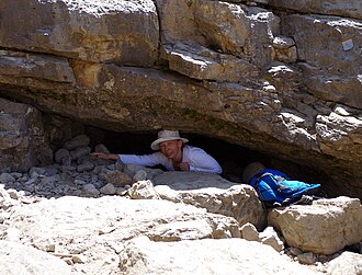 Boybuloq Cave Entrance with Elena Ljubavina.jpg