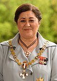 A woman wearing medals