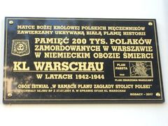 Commemorative plaque placed in 2017, which follows Trzcińska's hypothesis of the camp's history. The plaque reads: "We consecrate the white blot of history that was being hidden [from us] to Our Lady, the Queen of Polish martyrs: In homage to the 200,000 Poles murdered in Warsaw in the German extermination camp KL WARSCHAU in 1942-1944. The camp existed 'in the framework of the annihilation of the Capital of Poland' - from the Sejm resolution dated 27 July 2001 on the victims of KL Warschau. Compatriots - 2017" To the right, a scheme of Warsaw appears with the caption "Pabst Plan - 1940 - Plan of Warsaw's destruction".