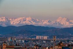 Evening view of the mountain range from Patan, Lalitpur.jpg