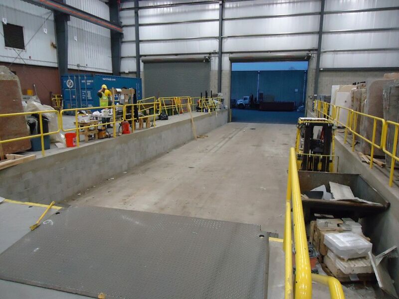 File:Warehouse in New Jersey where trucks deliver granite slabs.jpg