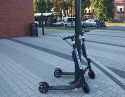 Electric scooters, Warszawska Street in Tomaszów Mazowiecki, Łódź Voivodeship, Poland, August 2020.jpg