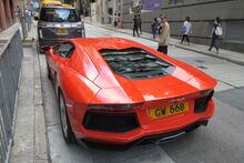 HK 上環 Sheung Wan 普仁街 Po Yan Street red race car 林寶堅尼 Lamborghini parking June 2017 IX1 01.jpg
