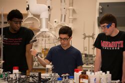 3 men in Monmouth College Chemistry Lab.jpg