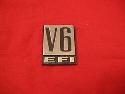 Dodge V6 EFI fender badge.jpg