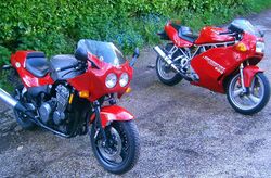 2 red bikes.jpg