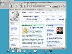 A screenshot of OpenWindows running the Mozilla web browser open to the front page of the English Wikipedia. The default DeskSet tools appear at the bottom of the screen.