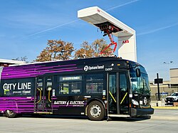 Front half of Spokane City Line bus charging at SCC transit center October 2023.jpg