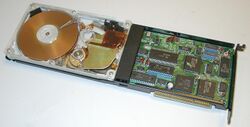 A Hardcard 20 hard disk on a card with an acrylic cover for display purposes. The Hardcard from Plus Development was the first hard drive on a plug in card for PCs.
