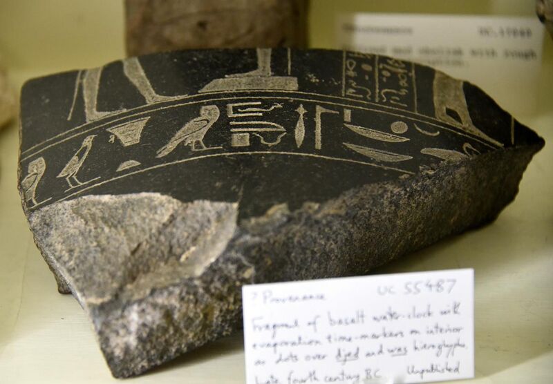 File:Fragment of a basalt water-clock with evaporation time markers on interior as dots on djed and was hieroglyphs. Late period, 30th Dynasty. From Egypt. The Petrie Museum of Egyptian Archaeology, London.jpg