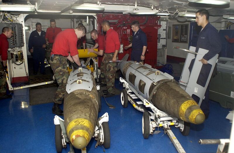 File:US Navy 030319-N-4142G-020 Ordnance handlers assemble Joint Direct Attack Munition (JDAM) bombs in the forward mess decks.jpg