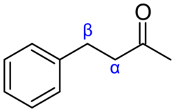 Alpha and beta positions of benzylacetone-structure.svg