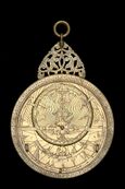 photograph of an astrolabe with a geared calendar