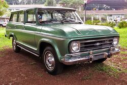 Front view, from the right, of a green 1972+ Chevrolet Veraneio