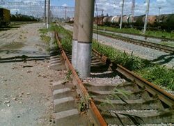 Poles inside rail lines.jpg