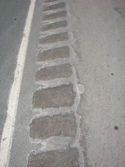 Traction sand filled rumble strip.JPG