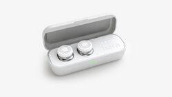 Here One earbuds in white charging case.jpg
