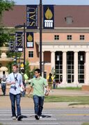 Southern Arkansas students walking on campus.jpg