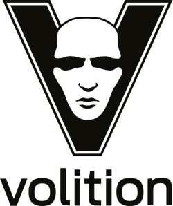 The letter "V" is displayed in black, with a white, male face shown in its center. Below the letter, the word "Volition" is rendered in lower-case letters.