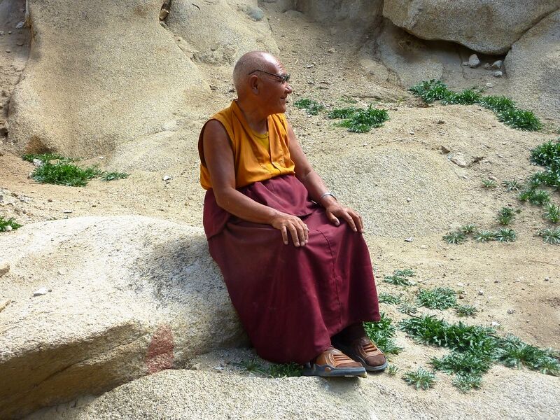 File:Monk resting outside Thag-Thok Gompa, Ladakh.jpg