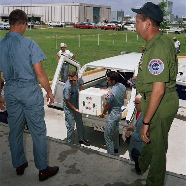 File:The first Apollo 11 sample return container is unloaded.jpg
