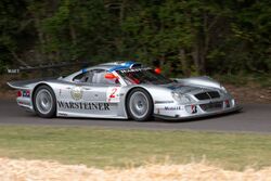 A Mercedes-Benz CLK LM in motion at the 2010 Goodwood Festival of Speed