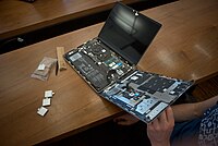A laptop opened up showing the internals
