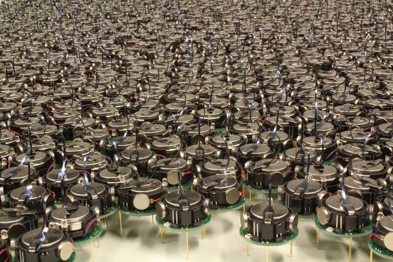 File:Kilobot robot swarm.JPG