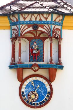 Szekesfehervar Historical Facade Clock Closeup 01.JPG