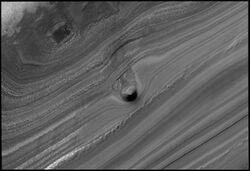 Conical mound in trough on Mars' north pole.jpg