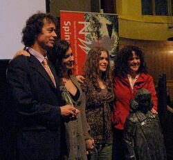Theo Rasing accepts his Spinoza Award with his wife & daughters.jpg