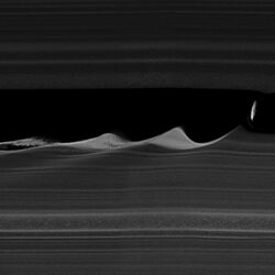 Daphnis makes waves - 4x vertical stretch.jpg