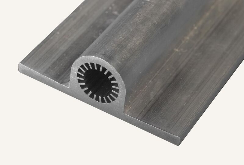 File:Grooved Aluminum Extrusion for Spacecraft Heat Pipes.jpg