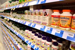 Rows and rows of pill bottles on shelves