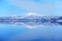 Mount Akita-Komagatake seen from Lake Tazawa 20210213.jpg