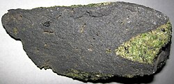 Peridotite mantle xenoliths in vesicular phonotephrite (Peridot Mesa Flow, Middle Pleistocene, 580 ka; Peridot Mesa, San Carlos Volcanic Field, Arizona) 10 (31101103172).jpg