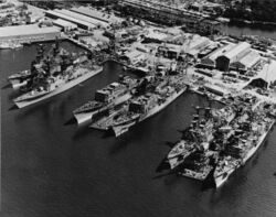 Six Spruance-class destroyers fitting out at Litton-Ingalls Shipbuilding, circa in May 1975 (USN 1162174).jpg