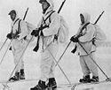 Norwegian Winter War volunteer soldiers in white snow overalls