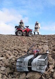The DARPA – US Army telerobot "Solon" and Crew 3 explore Devo Rock canyon on July 26, 2001.