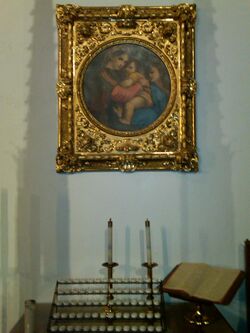 Madonna of the Child with votive candle rack and kneeler (United Methodist Church of the Saviour).jpg