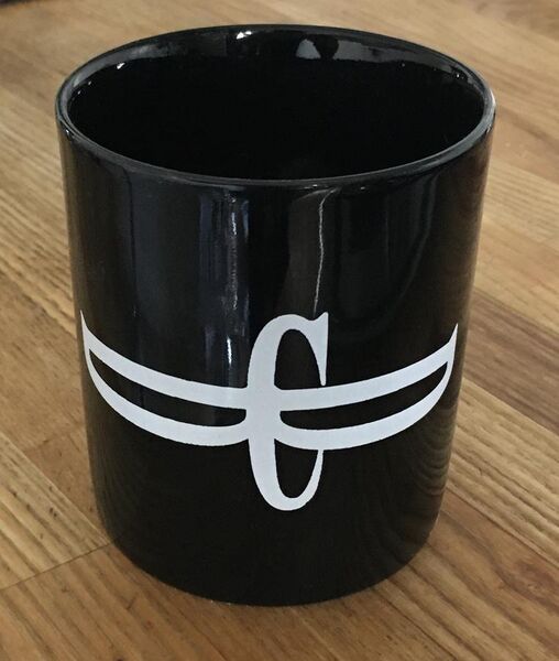 File:Merchandising Coffee mug from band Dead Can Dance with 'DCD' logo - black.jpg