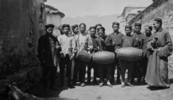 Newars in Lhasa with drums.jpg