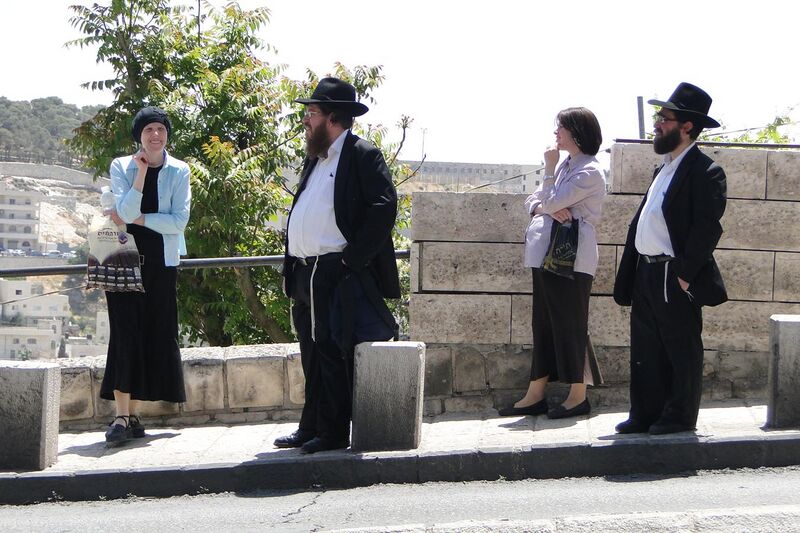 File:Haredi (Orthodox) Jewish Couples at Bus Stop - Outside Old City - Jerusalem (5684561290).jpg