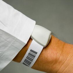 USID P-Tag On Wrist With Barcode.jpg