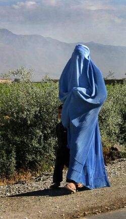 Woman walking in Afghanistan.jpg