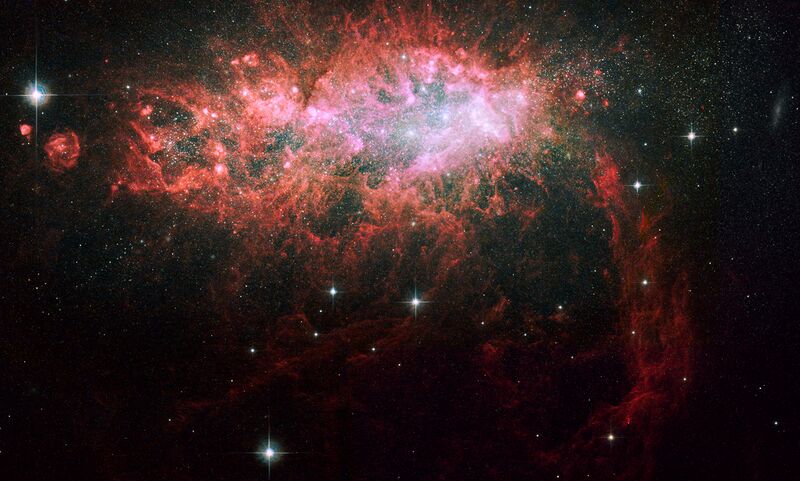 File:Starburst in a Dwarf Irregular Galaxy.jpg