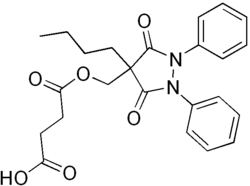 Two-dimensional monochrome diagram showing the structure of the molecule of Suxibuzone, uing the hexagonal style to depict a chemical compound.
